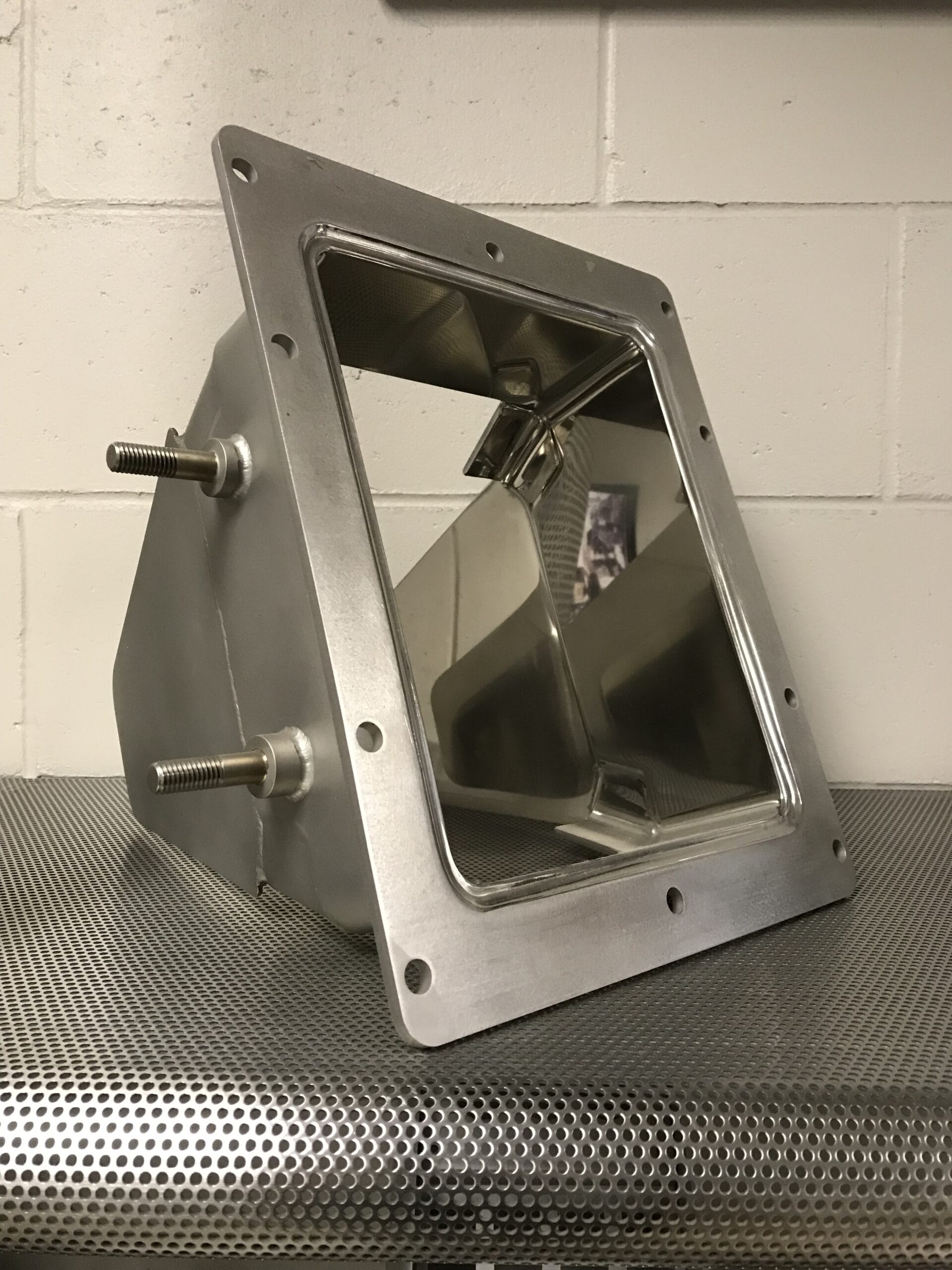 Hopper/filler assembly with interior polished to #8 finish and exterior bead-blasted.