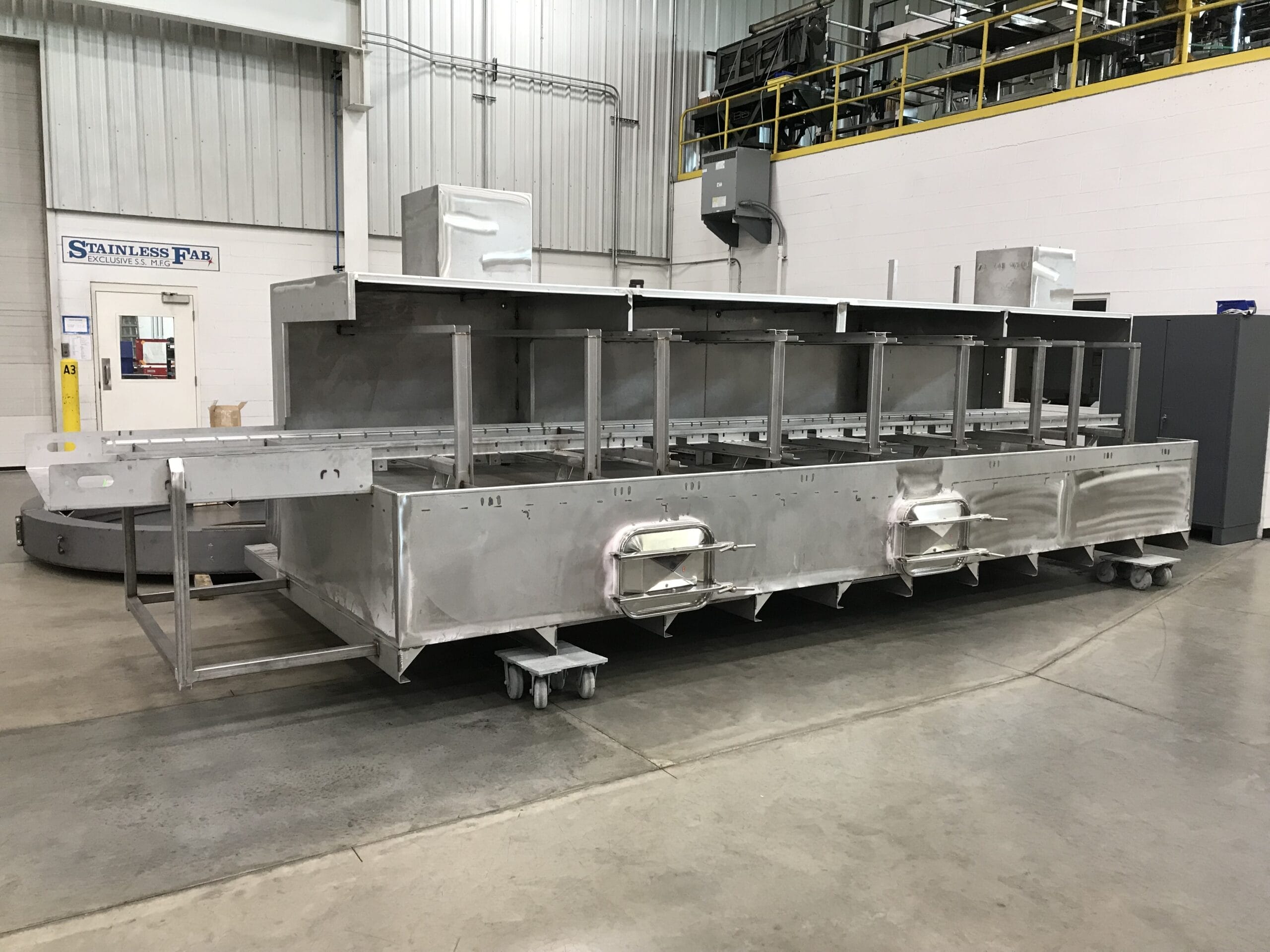 Large OEM parts washer for automotive degreasing applications.