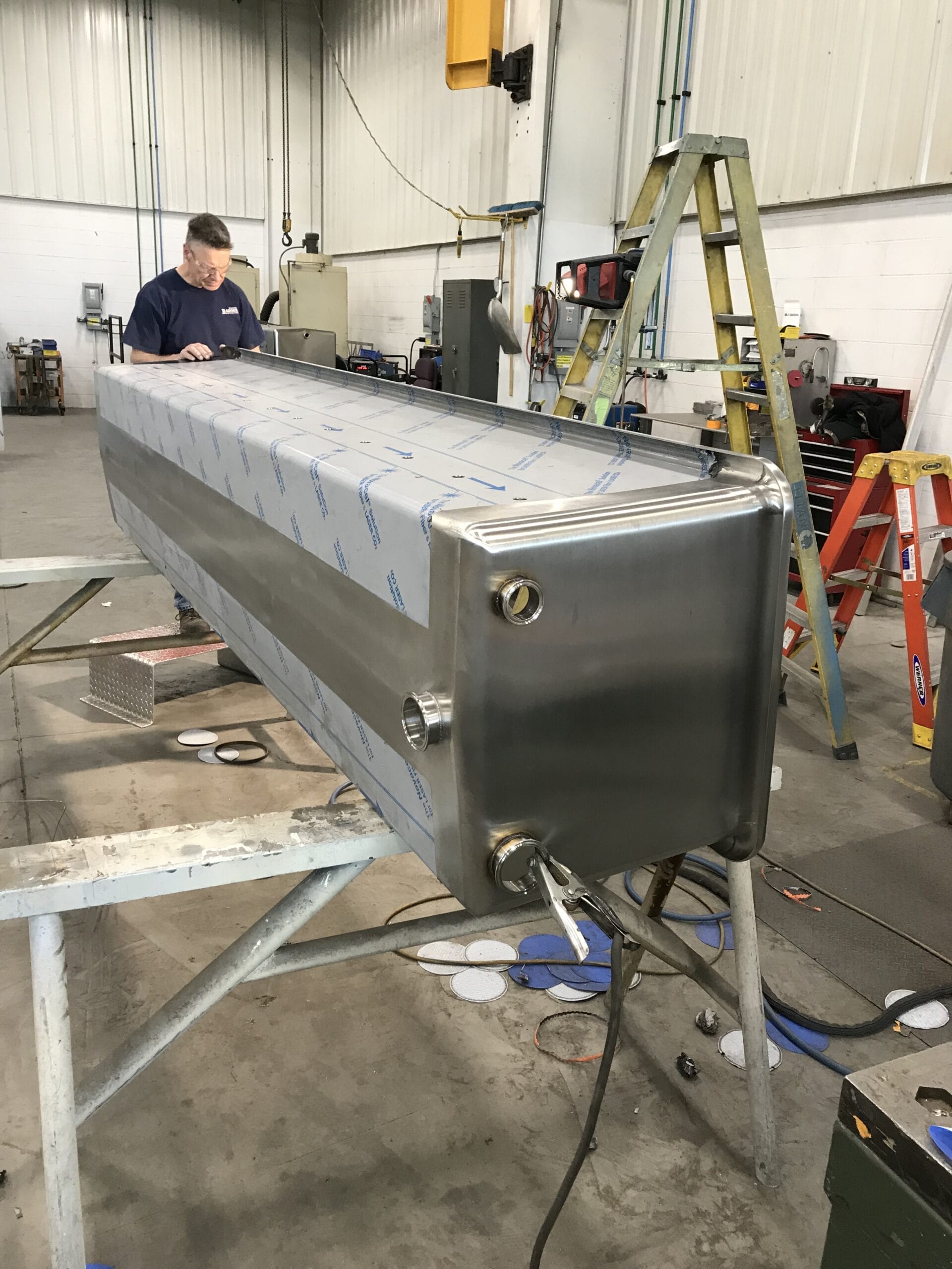 Sanitary enclosure with interior surfaces finished to 32 RA; radiused corners with welded spheres ground smooth.
