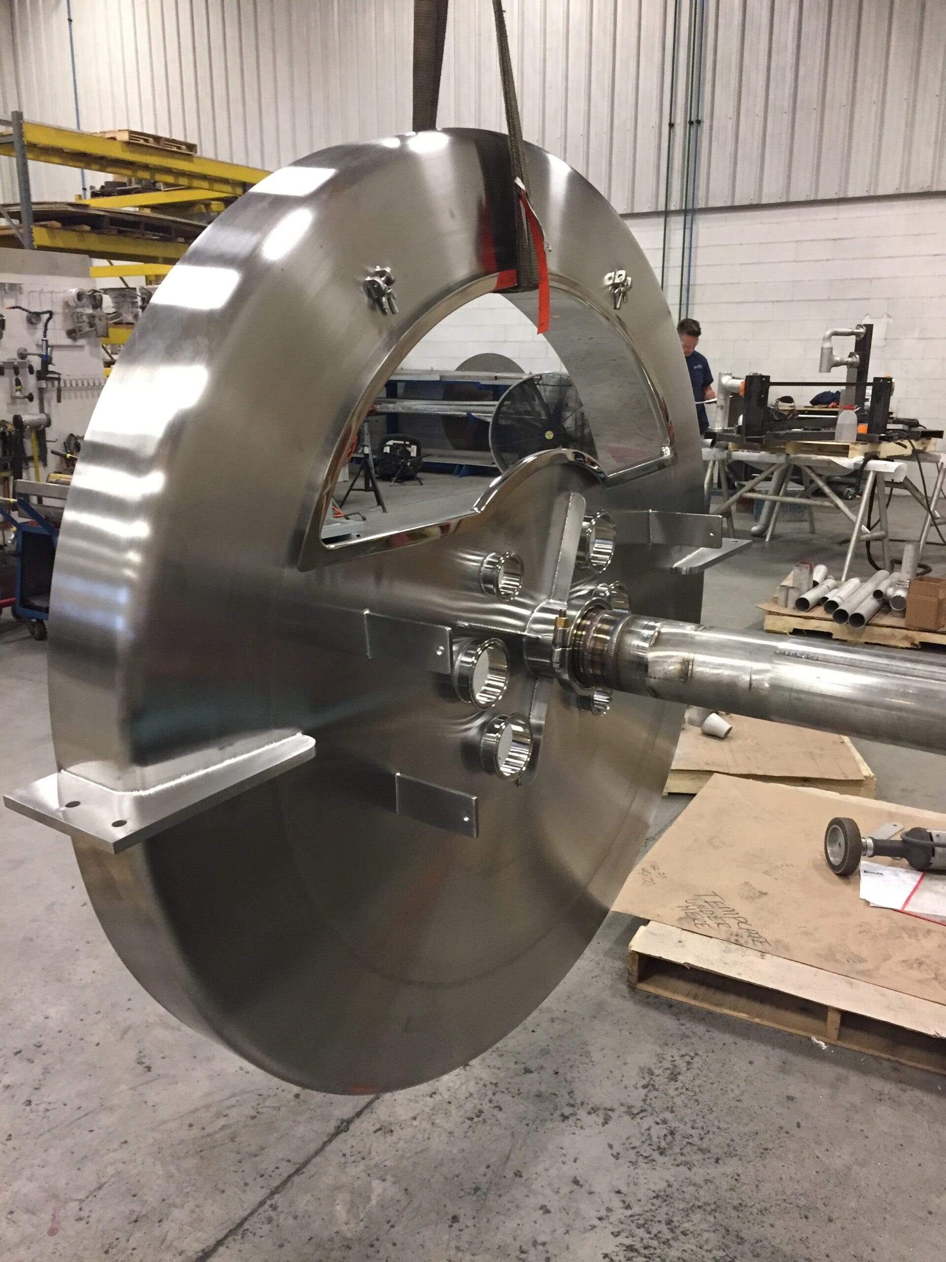 Bulk cover assembly showing sanitary couplings, hinge detail, and access door integration.