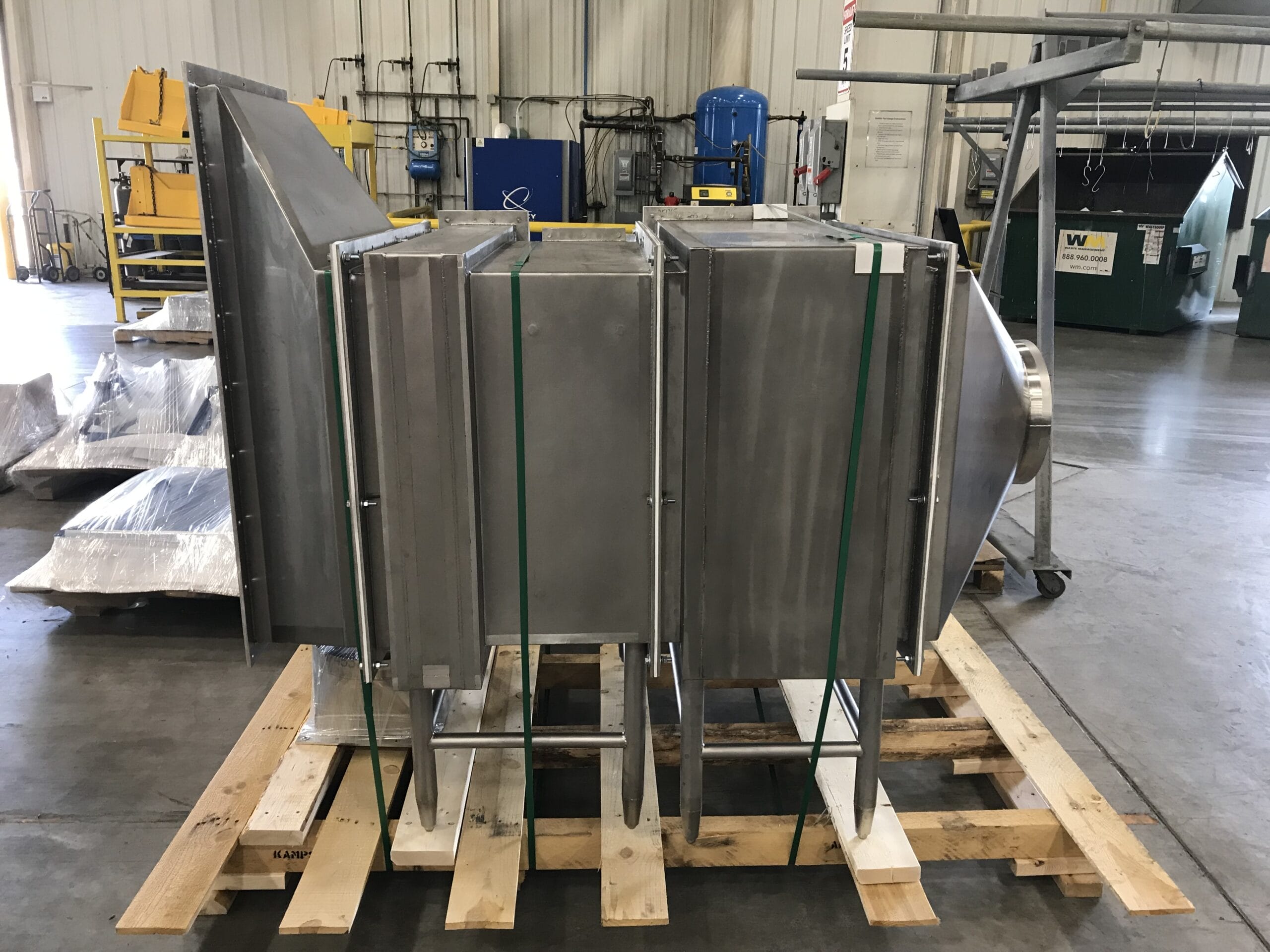 Filtration unit with expansion joint to accommodate temperature changes; 3-A sanitary application.