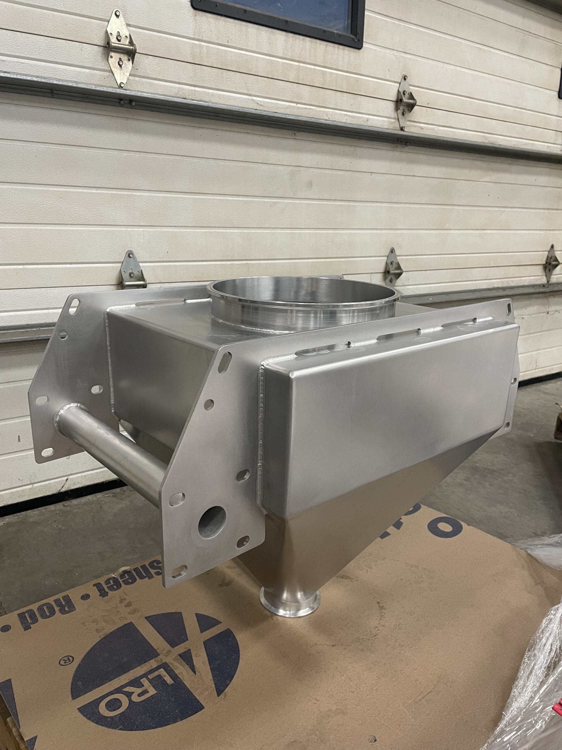 Pharmaceutical-grade enclosure (30" cube) with interior finished to 32 RA.