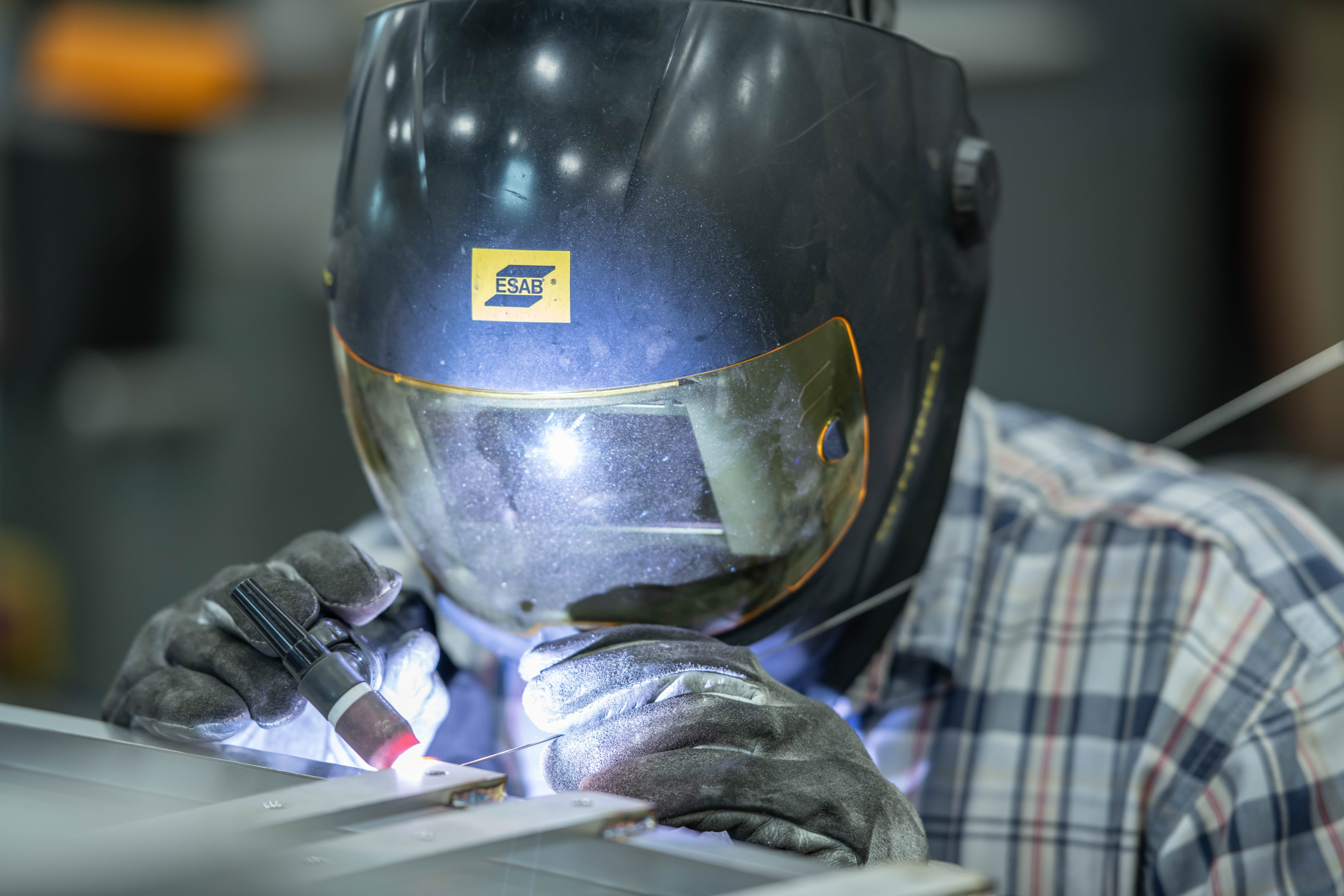 TIG welding of stainless component with controlled heat input for sanitary finish.